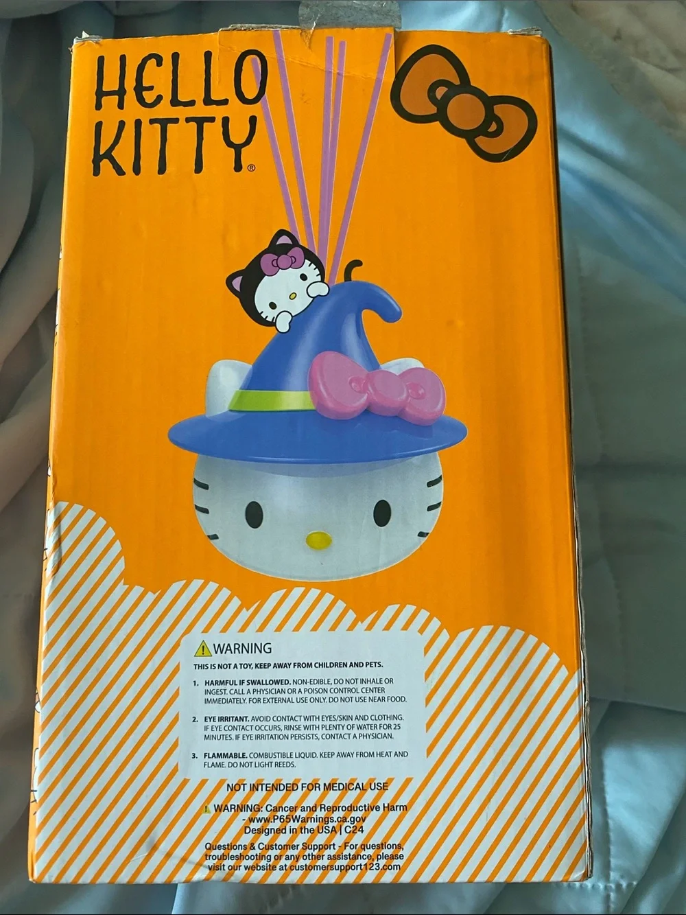 Hello Kitty Orange Box with Purple Hat and Pink Bow Reed Diffuser